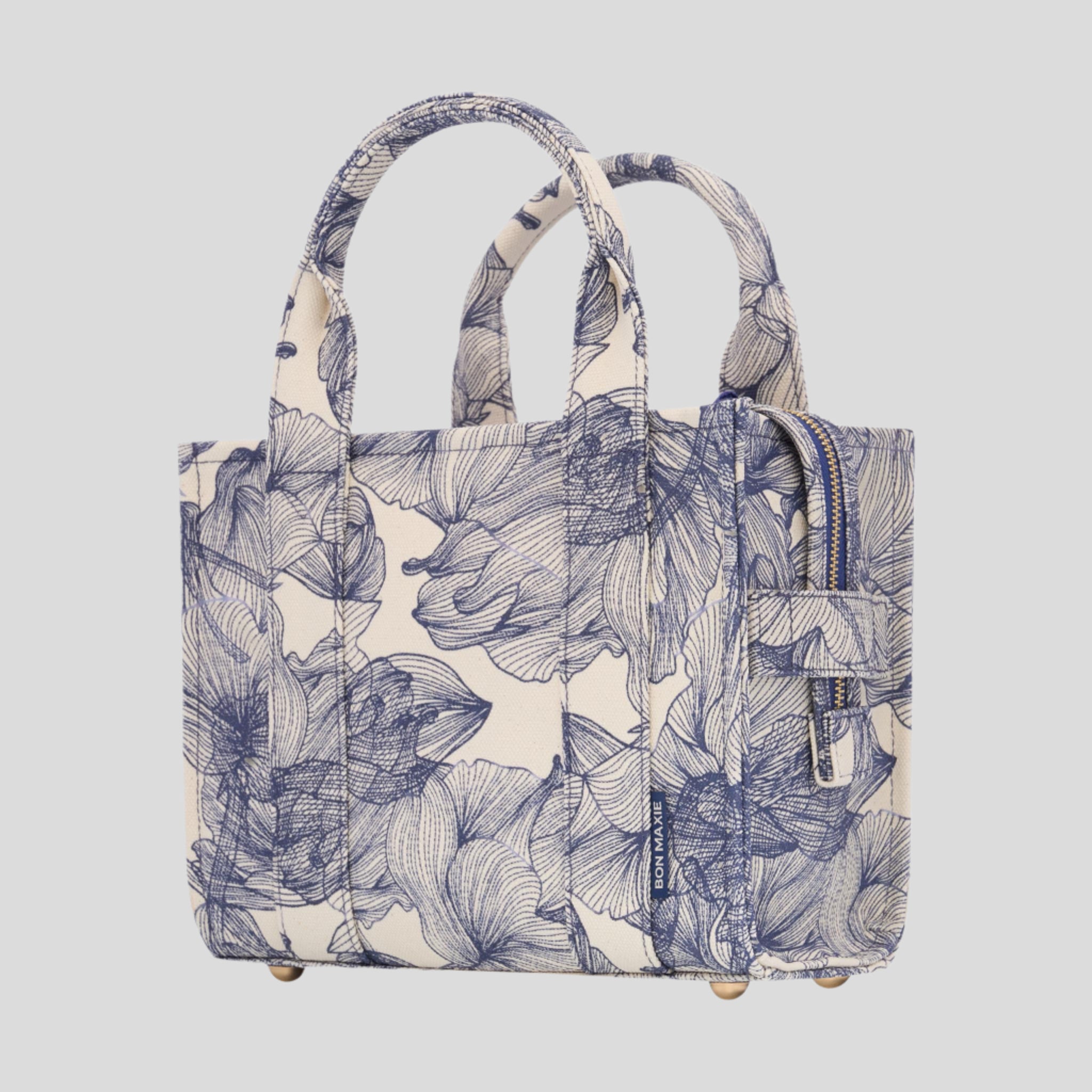 Micro Structured Tote Bag in signature coated canvas -- Navy Floral