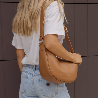 Slouchy Crescent Crossbody Bag in smooth nappa leather -- Tan