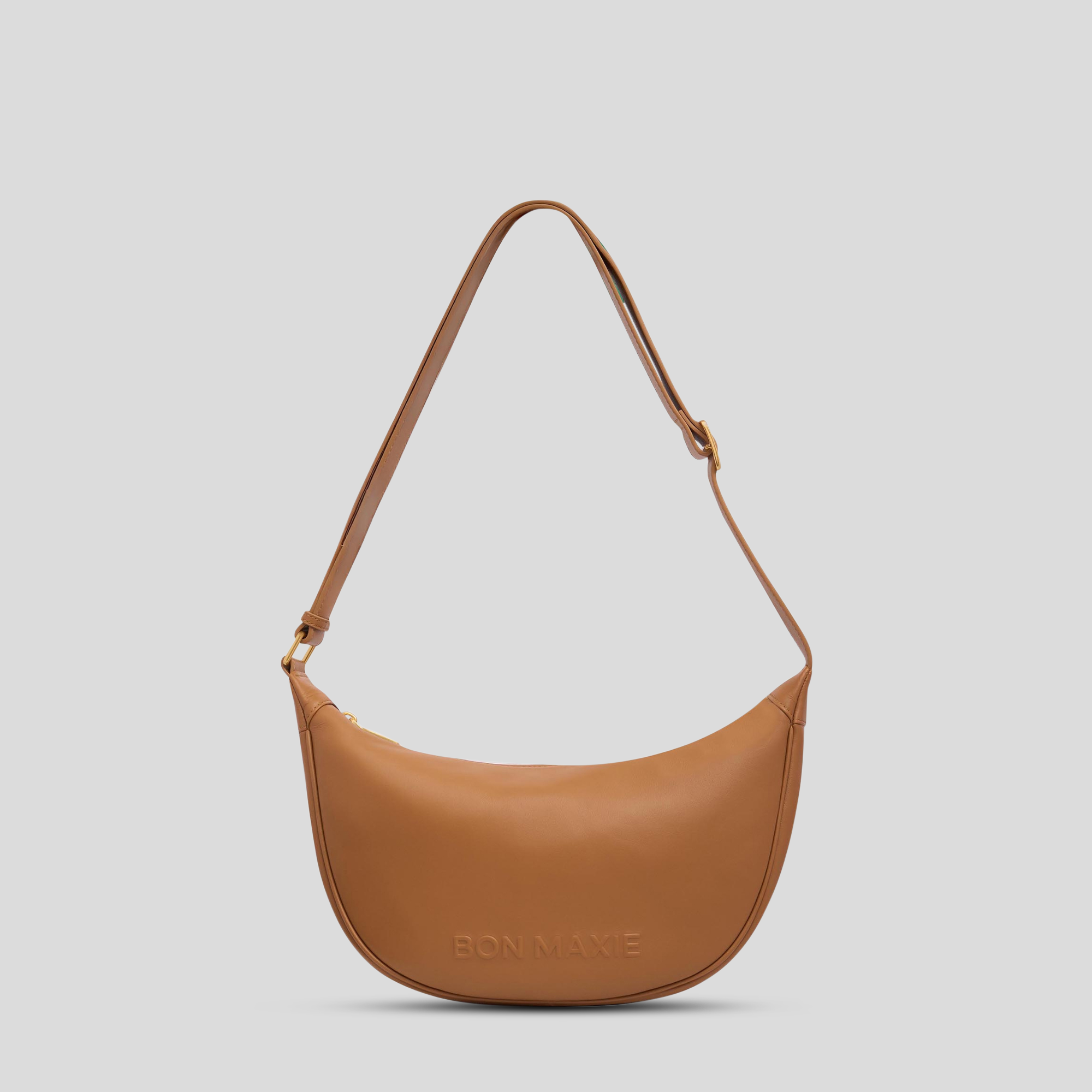 Load video: Slouchy Crescent Crossbody Bag in smooth nappa leather -- Tan