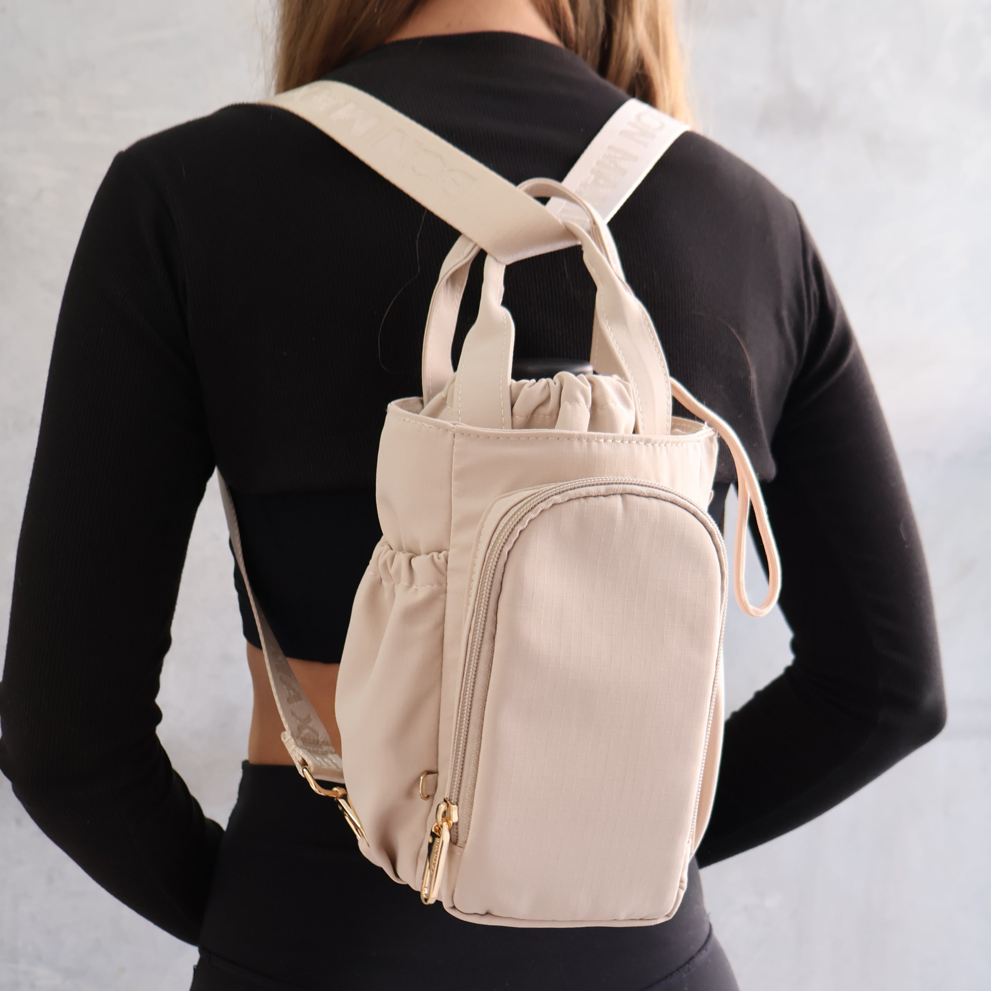 Multi-Wear Water Bottle Bag - Crossbody, Backpack, Sling, Handles - Oat Milk