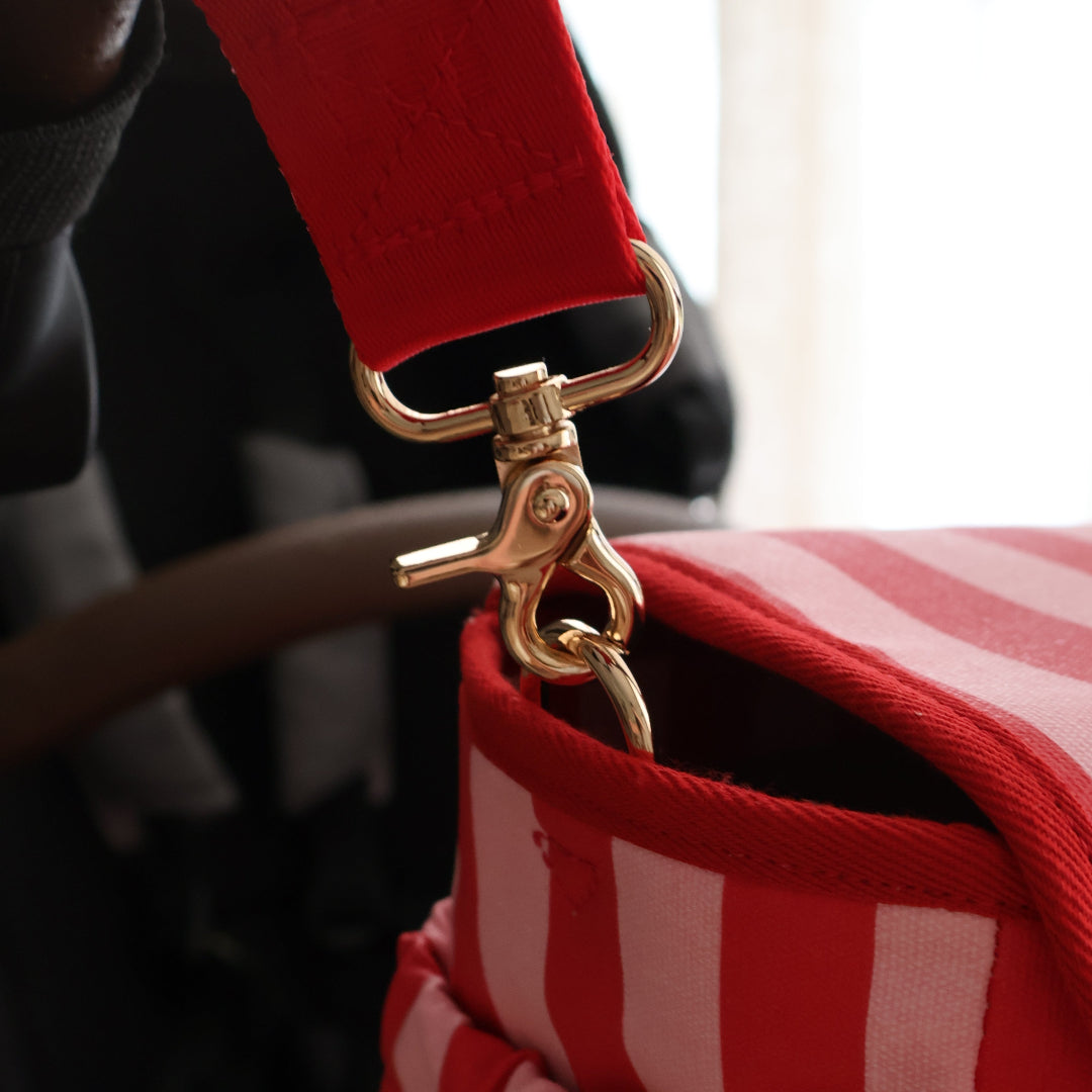 Nappy Bag/Pram Caddy Hybrid in coated canvas - Pink/Red Stripe