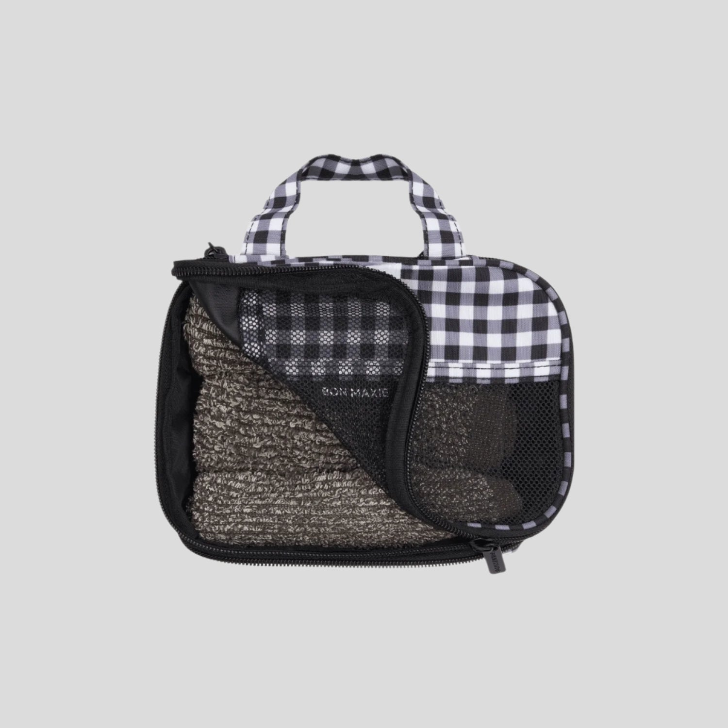 Black and white checkered travel bag with mesh pocket on a white background