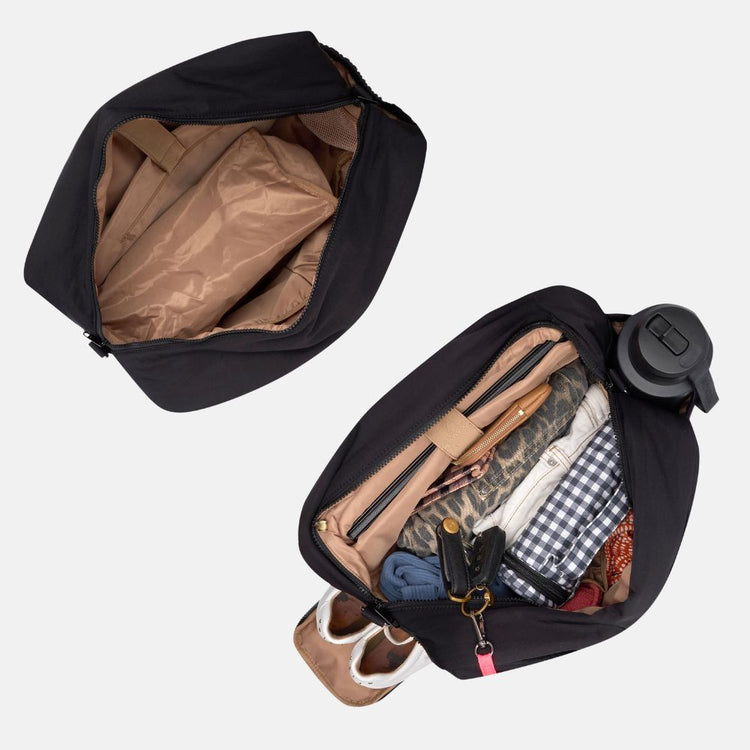 Bon Maxie Everyday Duffel Bag in black, open interior showing capacity