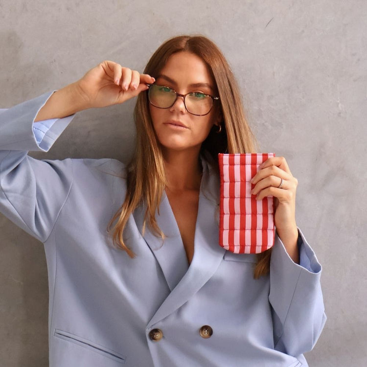 Bon Maxie Glasses case in pink red stripe being held