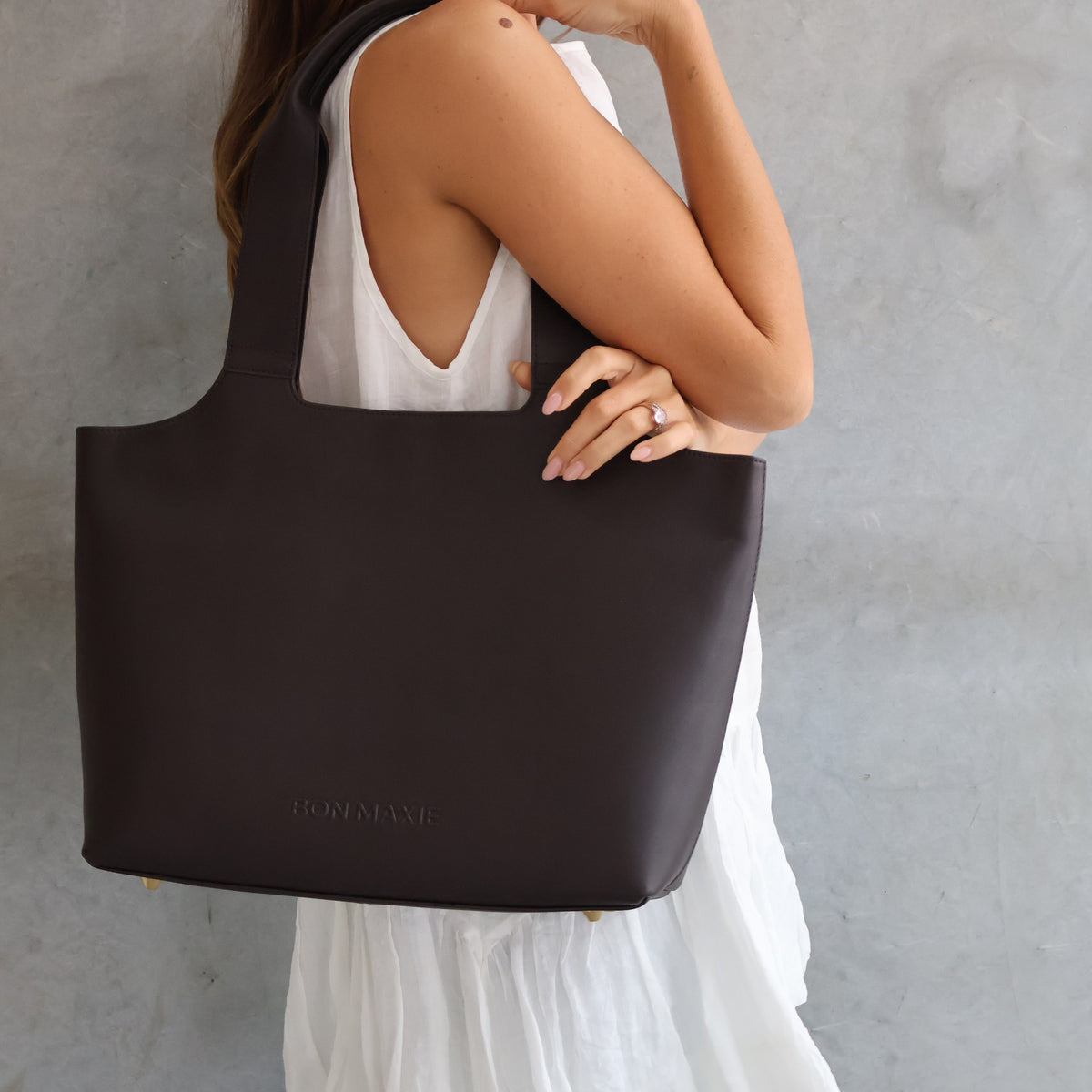 Maven Tote in Dark Chocolate Nappa Leather, worn on the shoulder