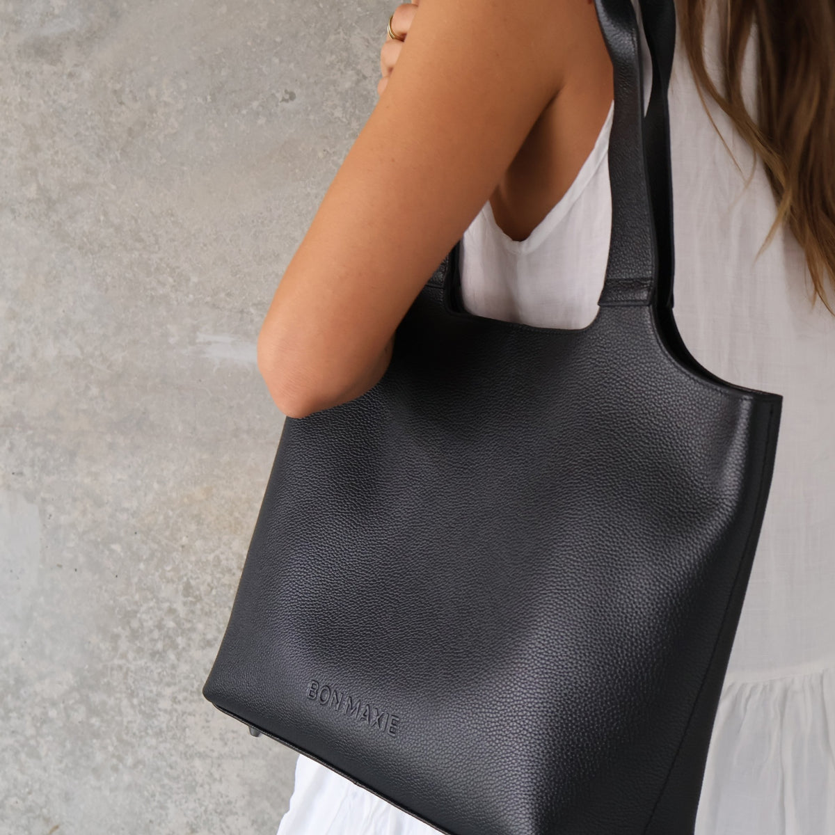 Maven Tote in Black Pebble Leather, styled on model