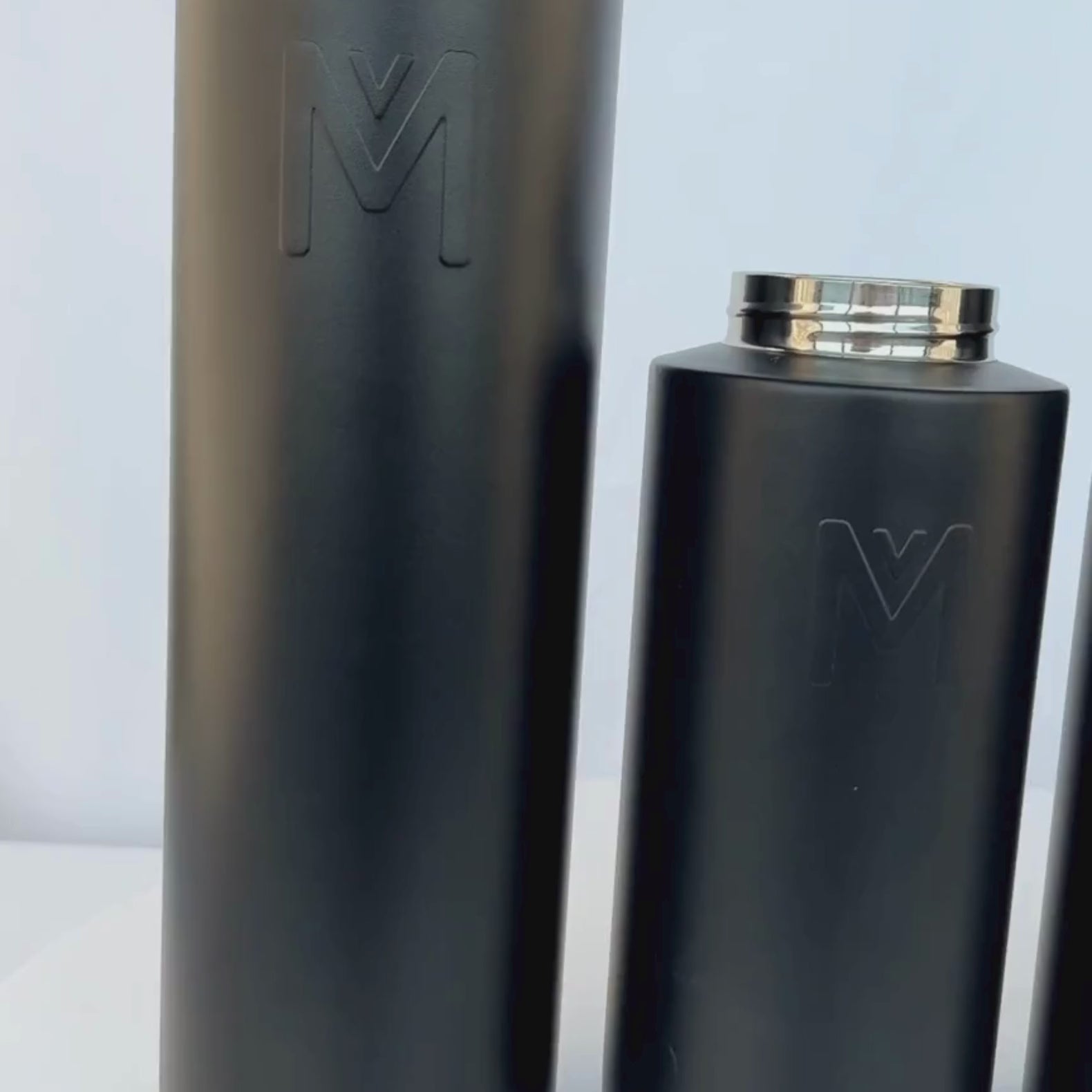 Load video: Insulated Drink Bottle 1L -- Montii Midnight