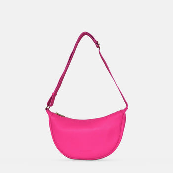 Slouchy Crescent Crossbody Bag in Neon Pink pebble leather